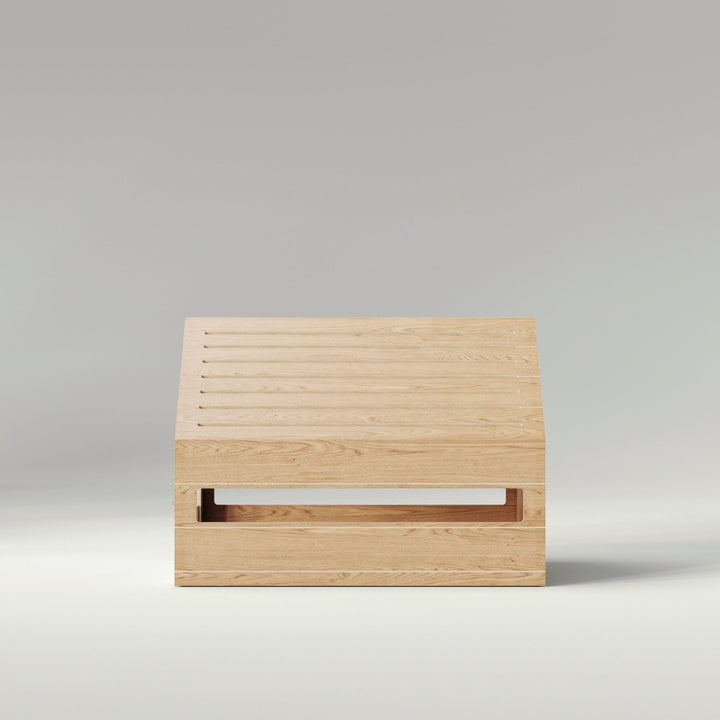 studio image of wooden dog crate in white oak from the side
